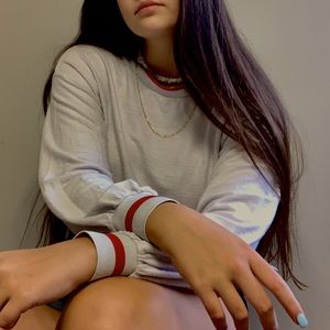 Sweater with red and white elastic cuffs